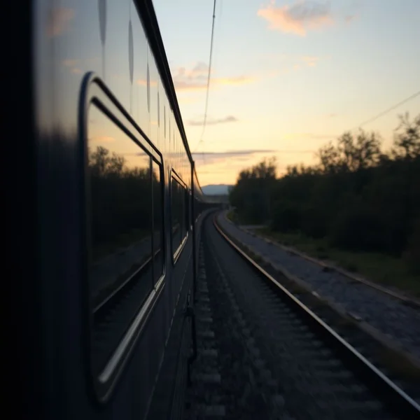 Image of a scenic train journey, symbolizing the movie Before Sunrise and the idea of arriving with no expectations. The image title is: Exploring "I came here with no expectations." for language learners.